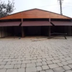 garaze-blaszane-blaszak-9x5drewnopodobne-zloty-dab-szerokosc-9-m-67335ea0869dd